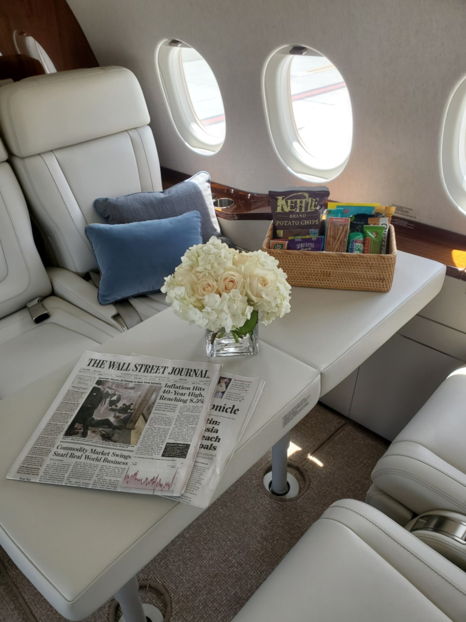 Flowers and snacks on private jet.jpg