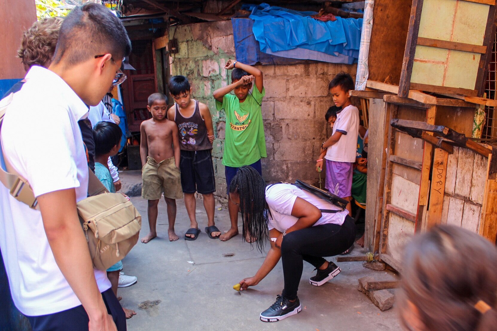 Playing with the kids while walking the streets of Tondo, Philippines