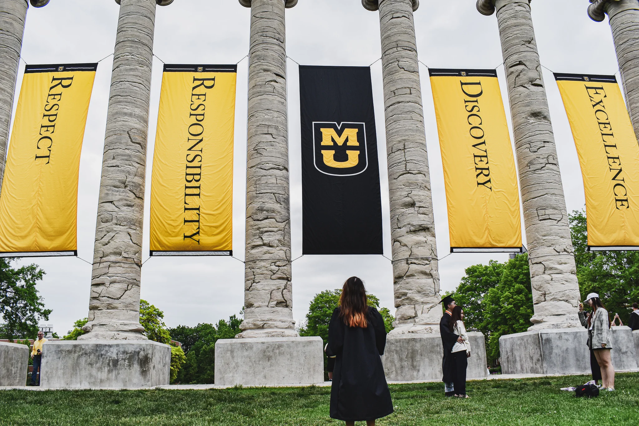 My newly-graduated sister admiring the iconic columns of the University of Missouri, my alma mater where I graduated Magna Cum Laude with degrees in International Business, Management, and Spanish.