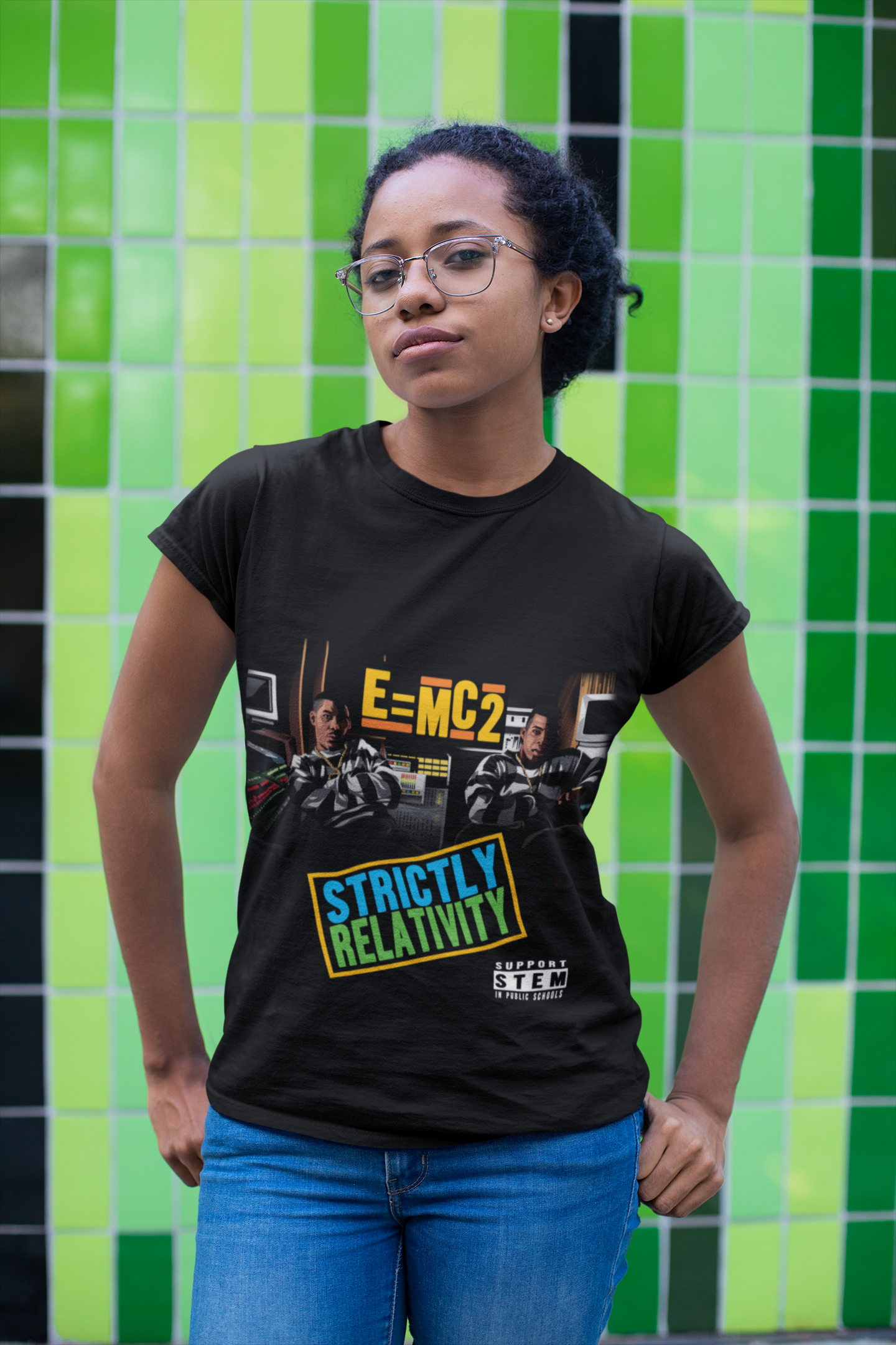 t-shirt-mockup-of-a-girl-with-glasses-standing-in-front-of-a-green-mosaic-24100.png