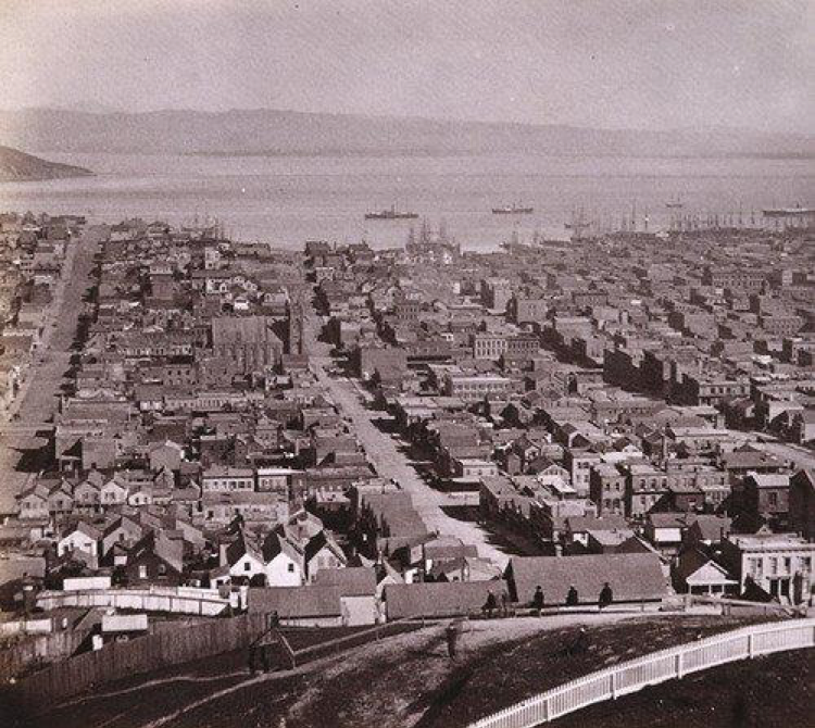 Figure 2.2: A portrait of San Francisco in 1870 from atop Russian Hill, later called Nob Hill. Sweeping down steep Vallejo Street past the busy commercial harbor and into the Bay, residential and commercial buildings are jammed into every space. The…