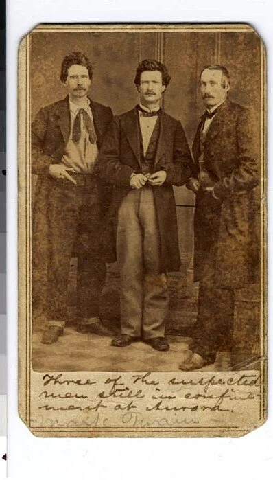 Figure 3.3: Movers and Shakers, Virginia City 1864. Mark Twain at 29 flanked by William H Clagett and A.J. Simmons. The trio pooled their funds to speculate in silver mines on which they had been tipped. Twain’s columns in the Territorial Enterprise…