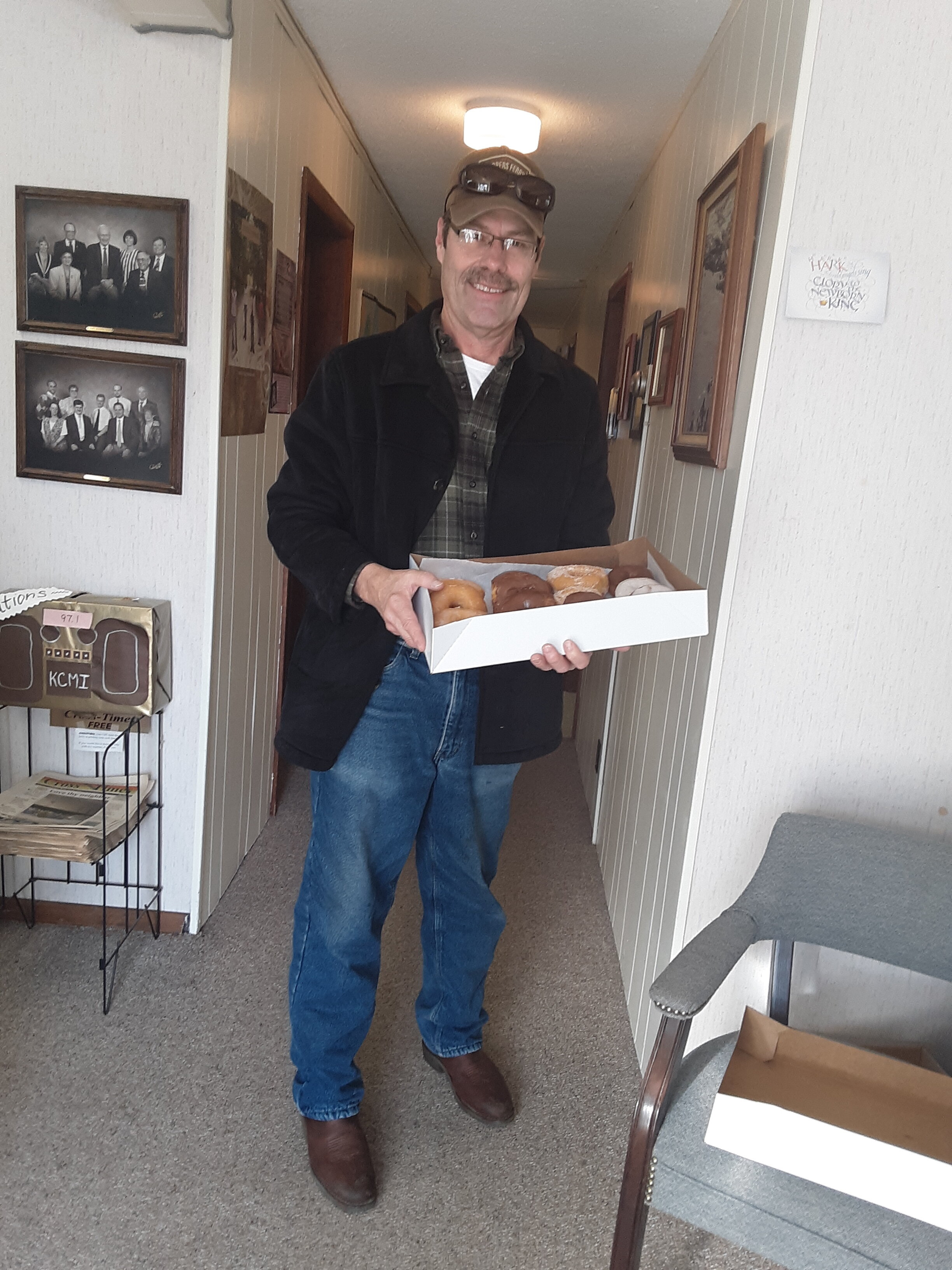  Pastor Scott Clark, of Scottsbluff Berean Church, picks up his donuts as part of our 12 Donuts of Christmas promotion. 