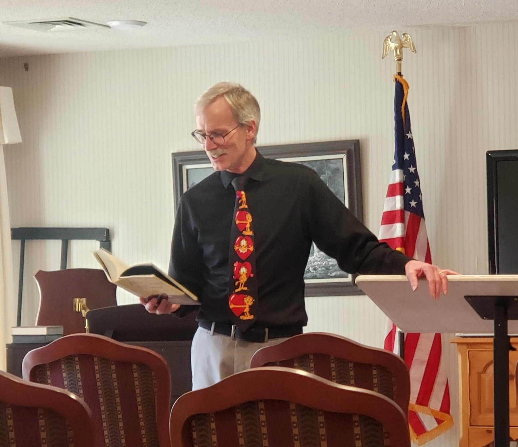 Russ Garrett leading the residents in singing a hymn