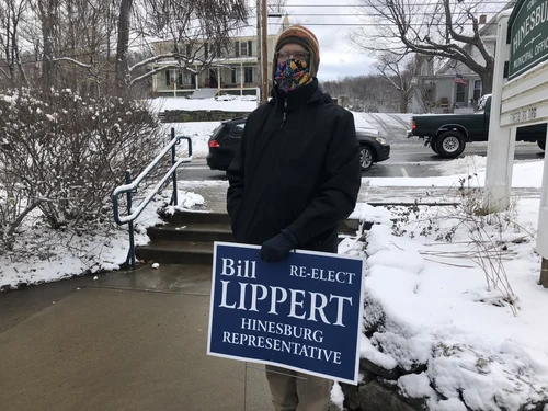 Bill Lippert, incumbent Hinesburg representative, doing last-minute campaigning outside Hinesburg Town Hall Tuesday Morning. (Tyler Lederer/Community News Service)