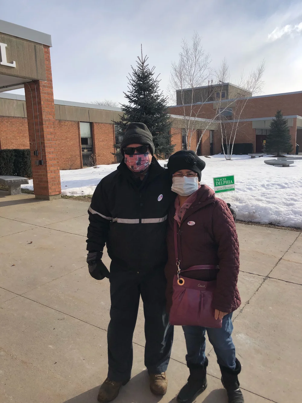 Jocelyn and Steven Cummings exiting the polls in Essex. (Jen Lannom/Community News Service)