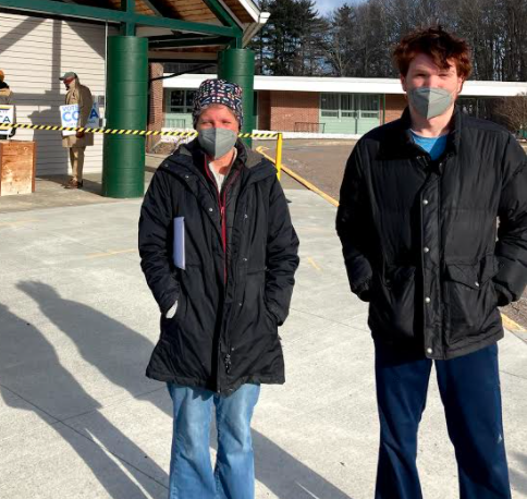 Heidi Smith and Tristan Petrosino stand outside Chamberlin Middle School preparing to cast their ballots Tuesday, March 2. (Aidan Scanlon/Community News Service)