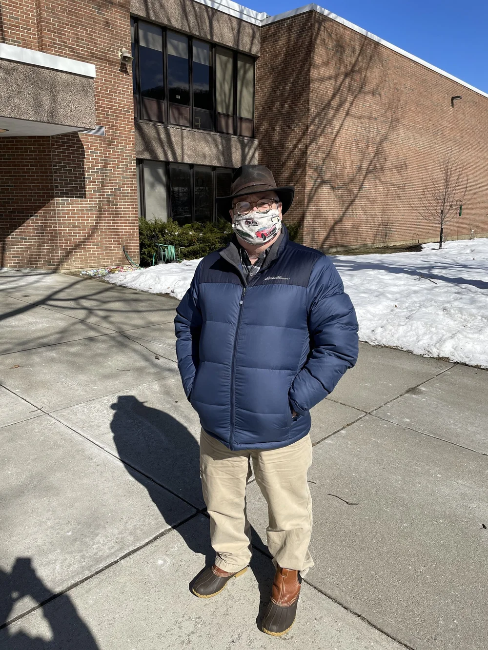 Peter Charlton, 68, outside of Camel’s Hump Middle School. (John Ely/Community News Service)
