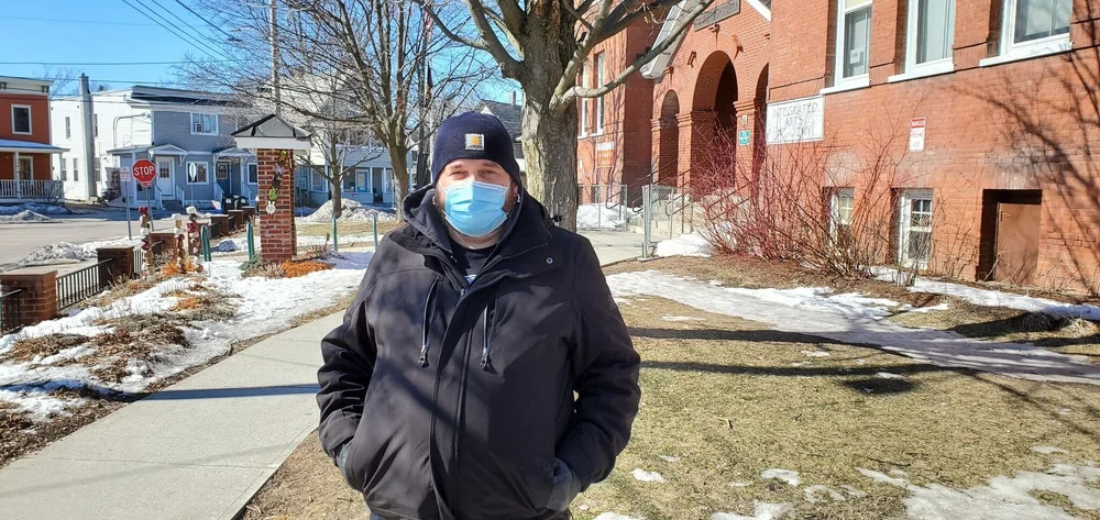 Nat Townsend roughed it to vote in-person in Burlington against a ballot item that would allow the city to regulate thermal energy systems. (Peter Christiana/Community News Service)