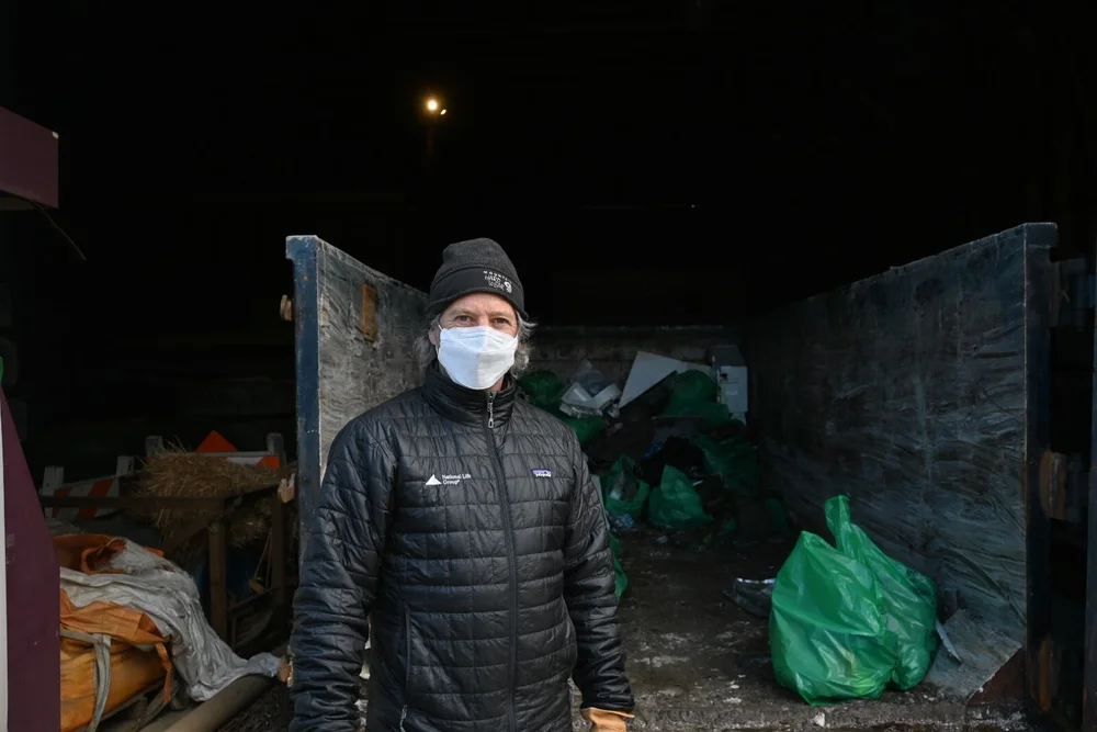 Waterbury resident Bill Minter, a seasoned Green Up Day volunteer, tends to a steady stream of cars and collects their copious spoils of roadside trash. Photo by Jenny Koppang.
