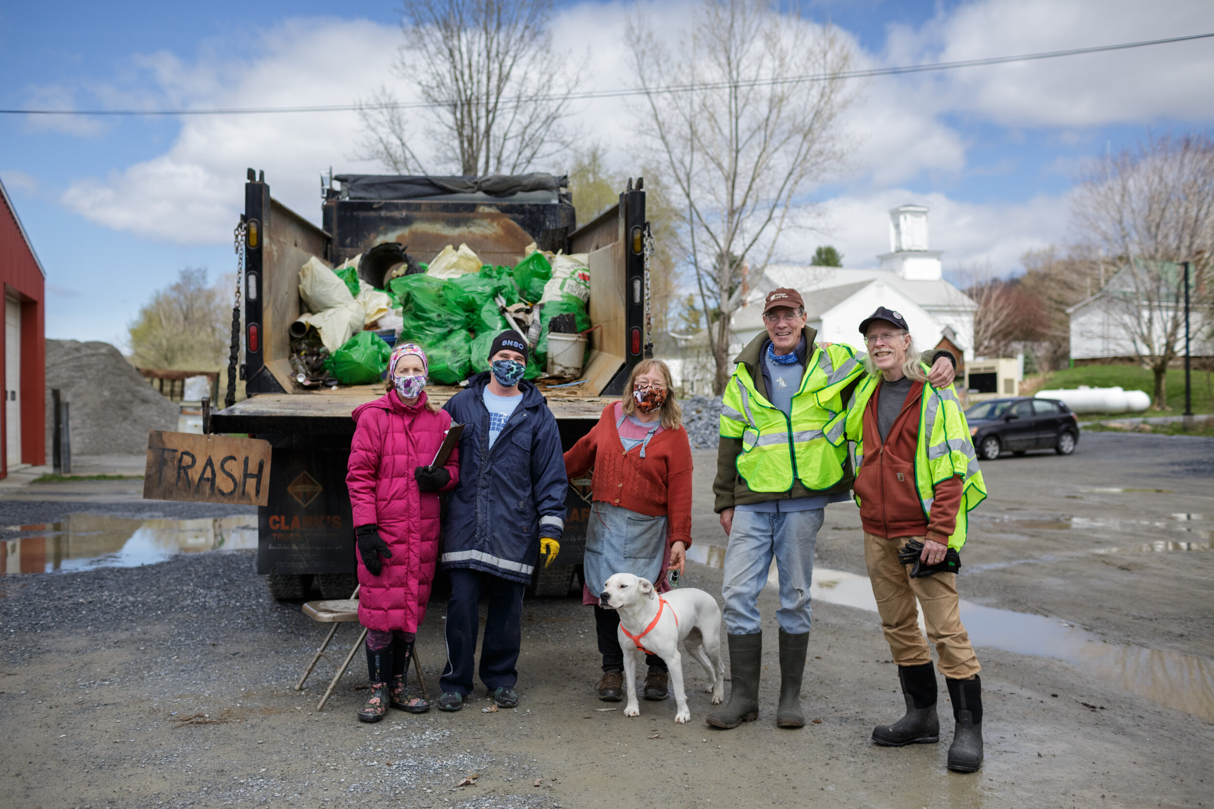 Heather Remy, John Remy, Town Clerk Heidi Racht, Henry R. Carse and Knox Cummin at the Huntington Town Garage green up day trash collection site. Photo by Anna Watts.