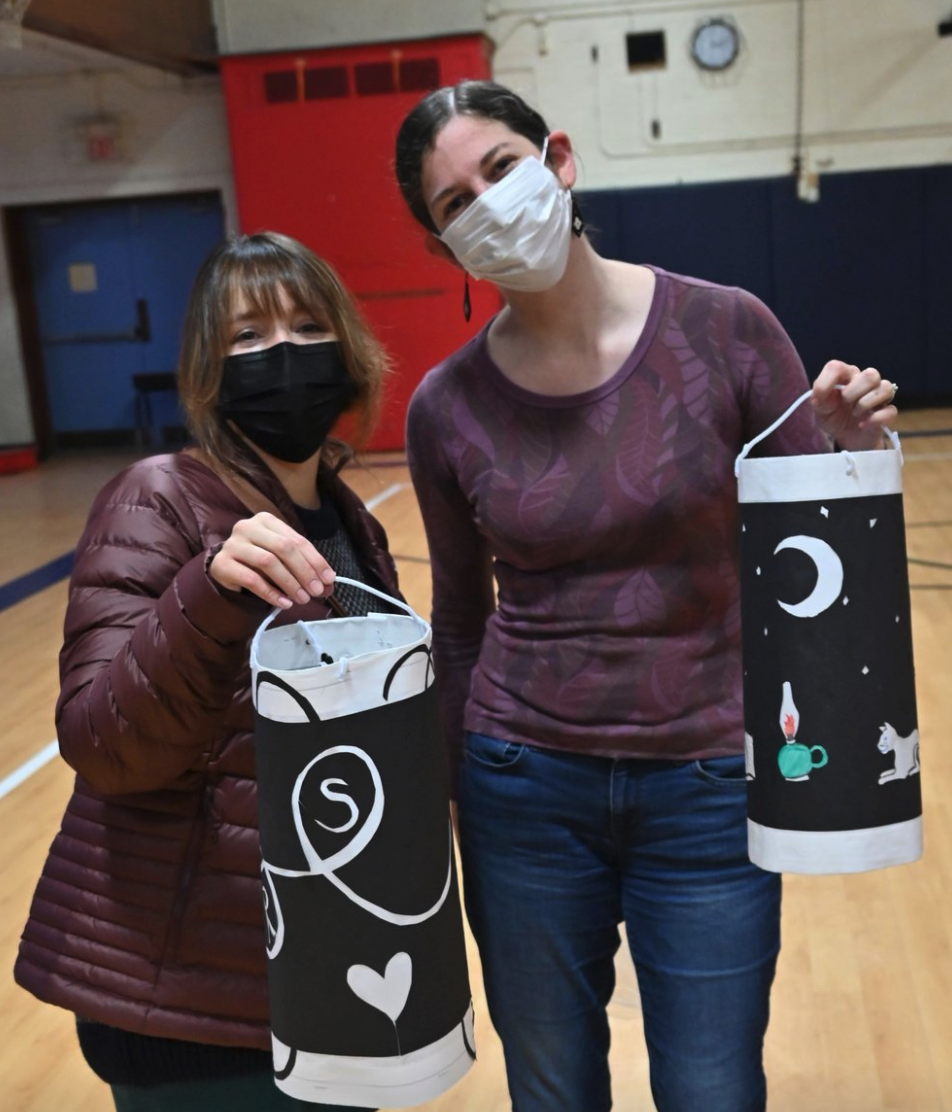  Maxine and Caitln McGowan are happy with their creations at the lantern workshop. Photo by Gordon Miller  