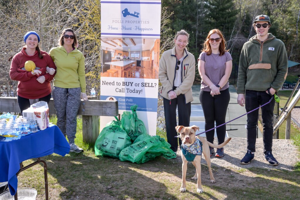  Elise Polli (second from the left) poses with her office mates at Polli Properties, Siobhan Philbin (far left) Hannah Ullman, Charlotte Nye, Garet MacLaren and Rudi who worked hard to green up Rossignol Park.  