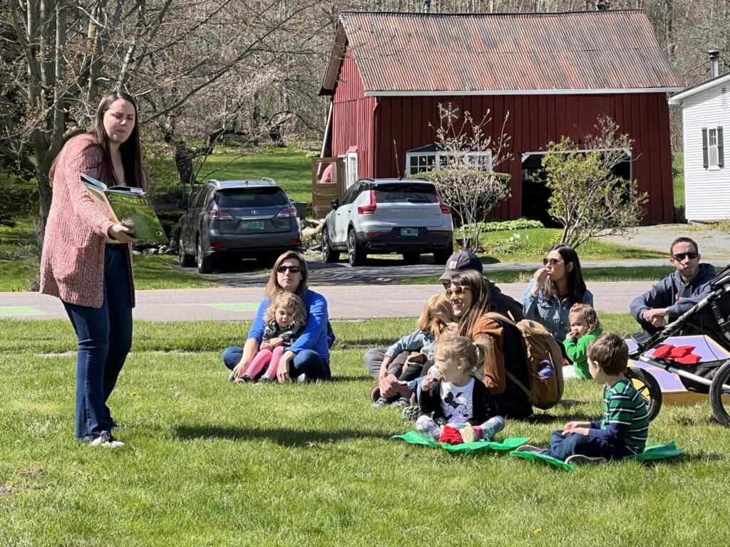  Bonnie Lord leads story time on the green. 