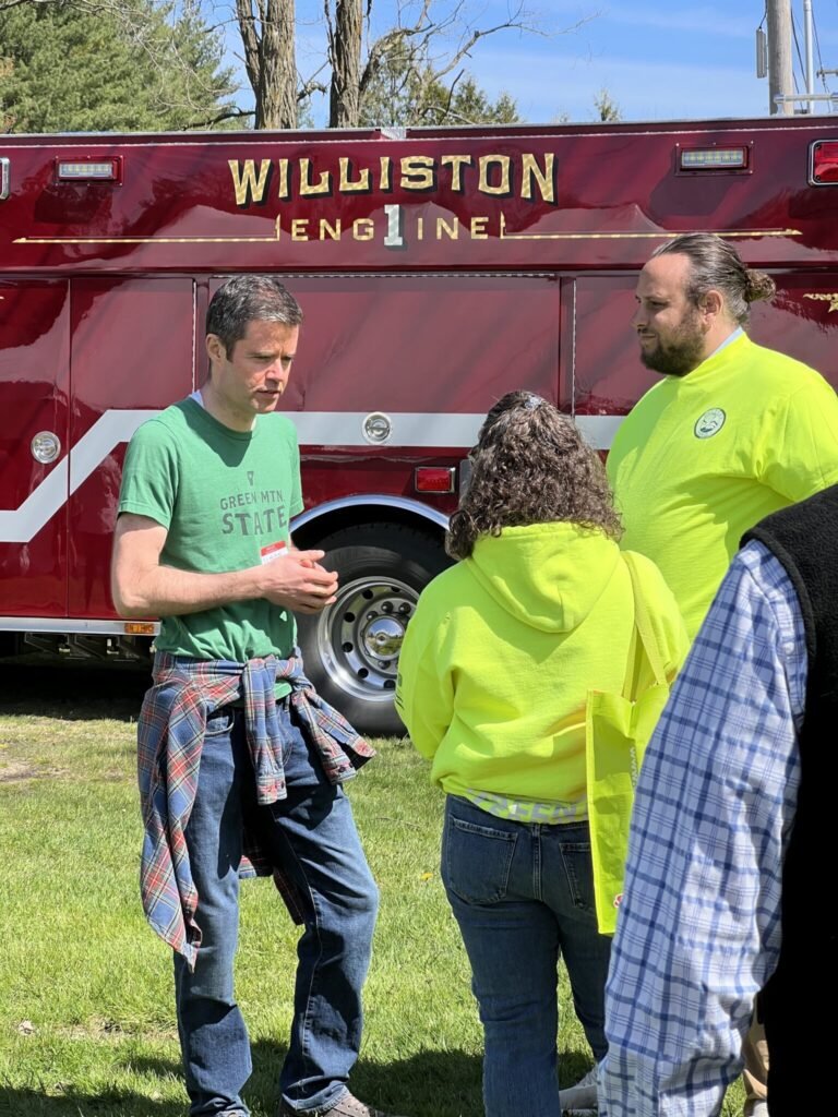  Simon Myles of the Williston Planning Department talks with Green Up Vermont organizers.  