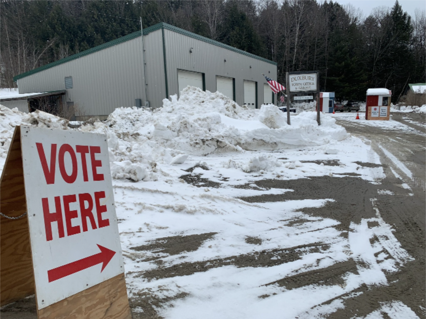  Drive-through voting becomes the main activity outside the Duxbury Town Office and Garage on Town Meeting Day. Photo by Lisa Scagliotti 