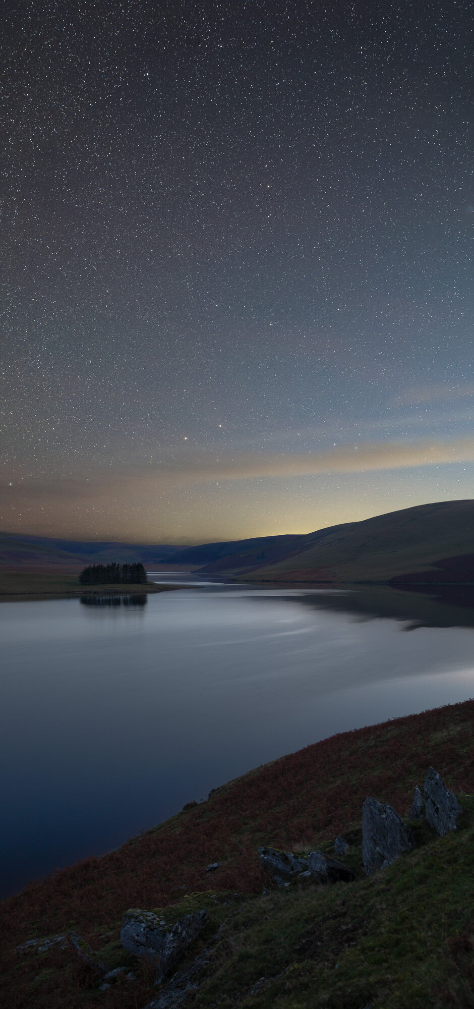The Pole star above a reservoir in a Mid-Wales dark sky site.