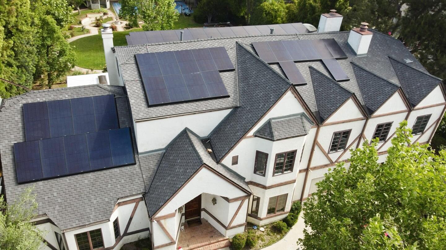 Traditional curb appeal meets high performance durability, while maximizing utility savings. #owenscorningwoodcrest roof shingle system, with #recalpha solar panels.