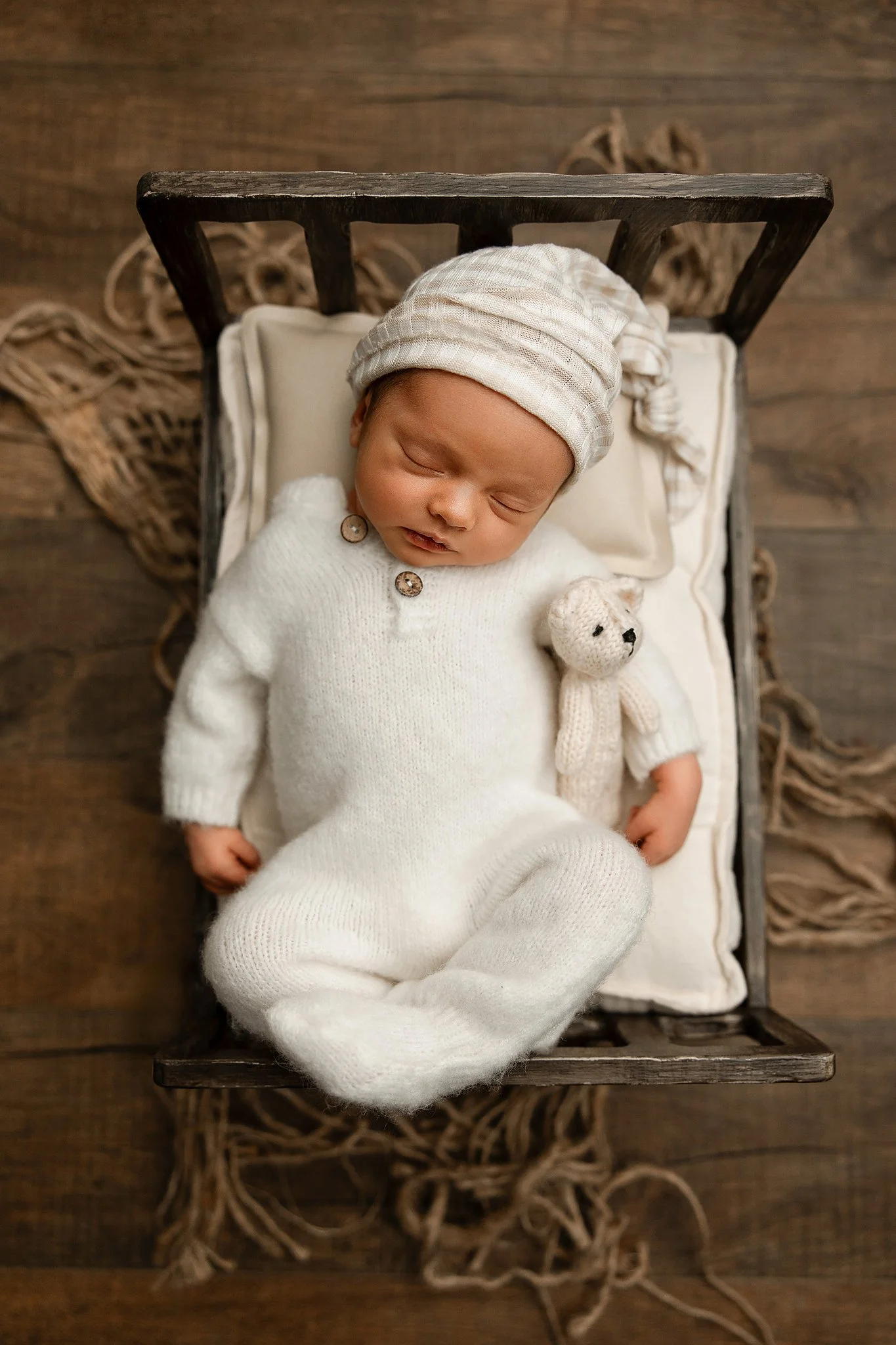 newborn baby sleeping during a studio photography session in Metro Detroit
