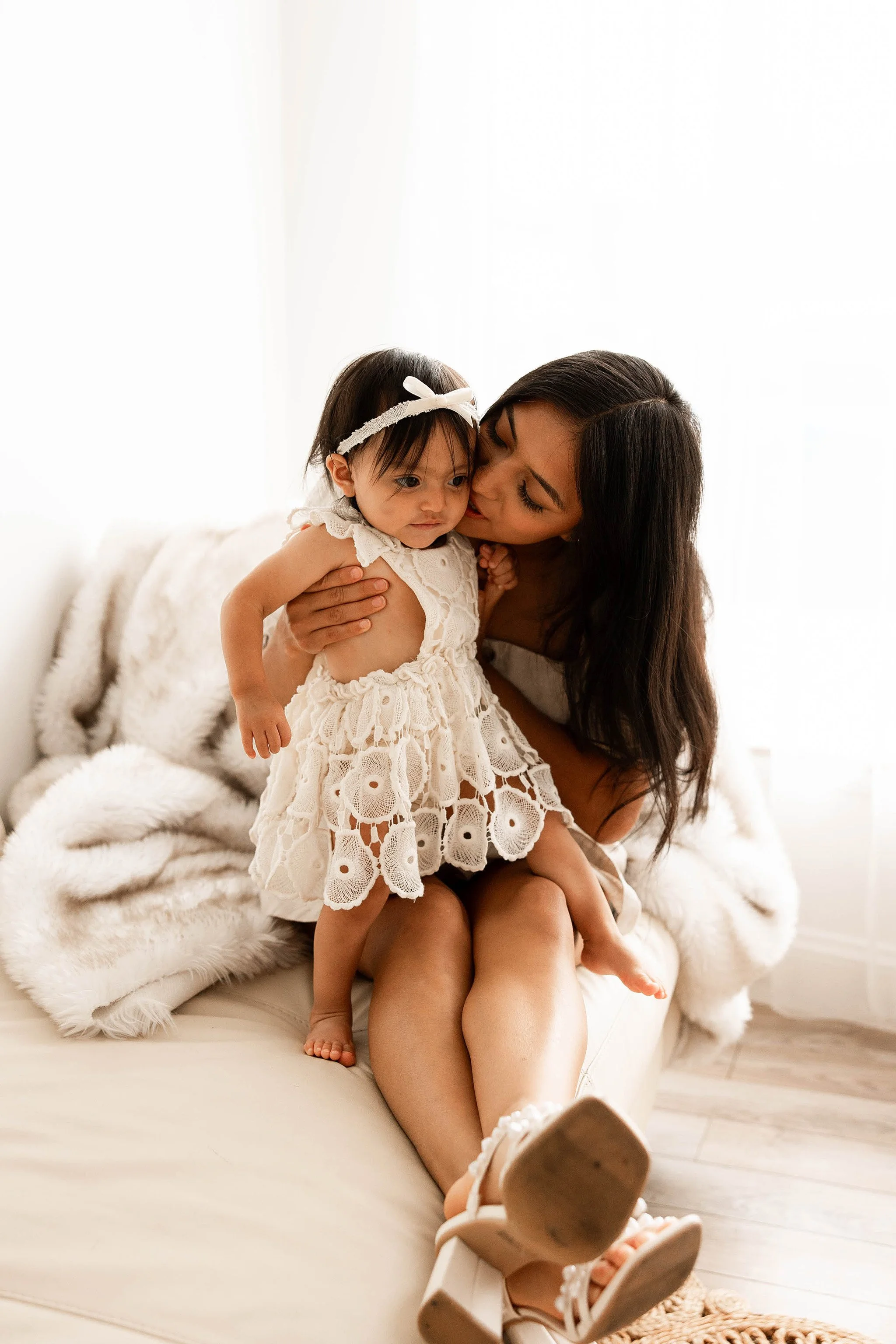 mom and baby first birthday portrait soft neutral tones