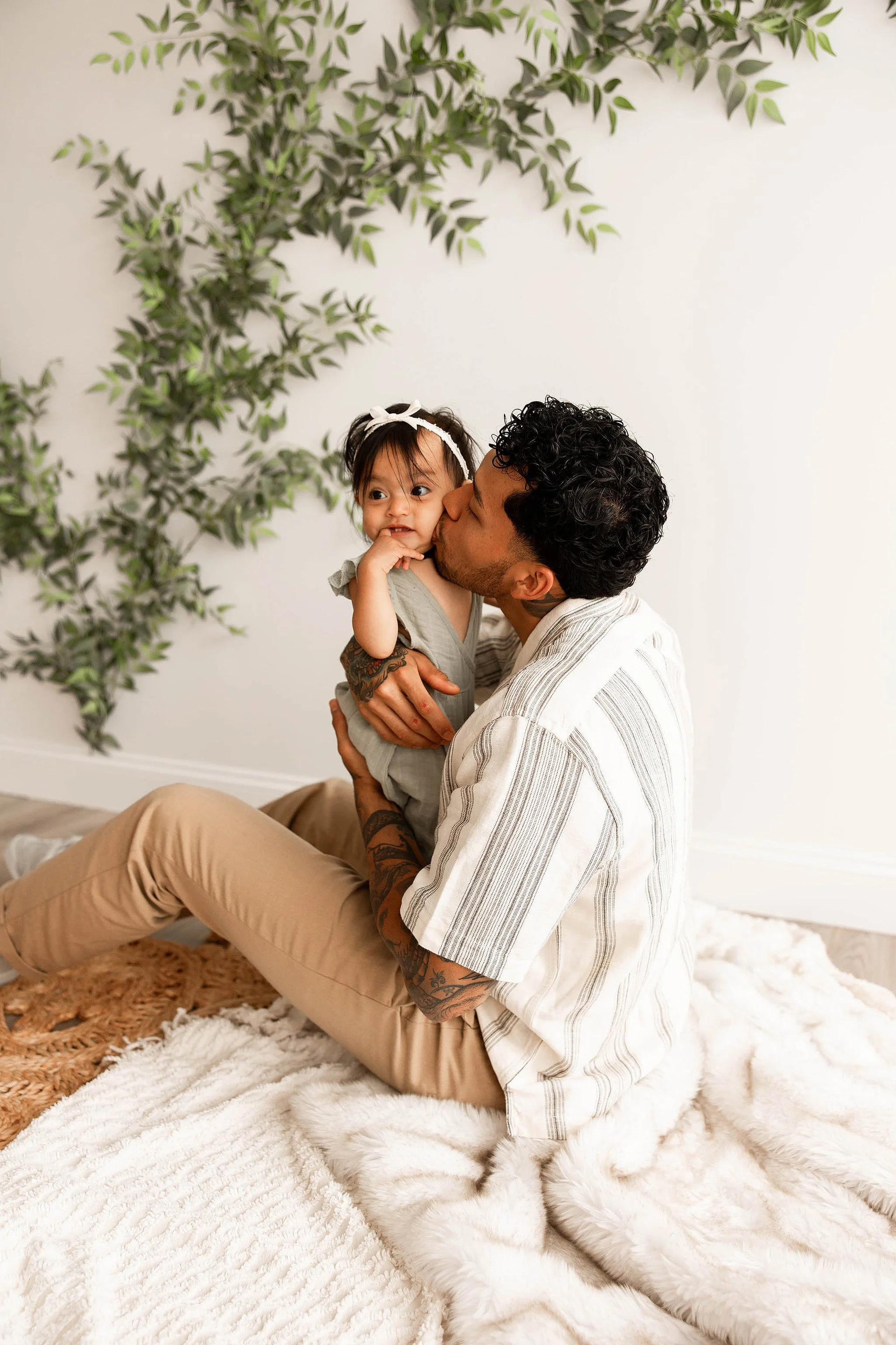 dad and baby first birthday portrait soft neutral tones