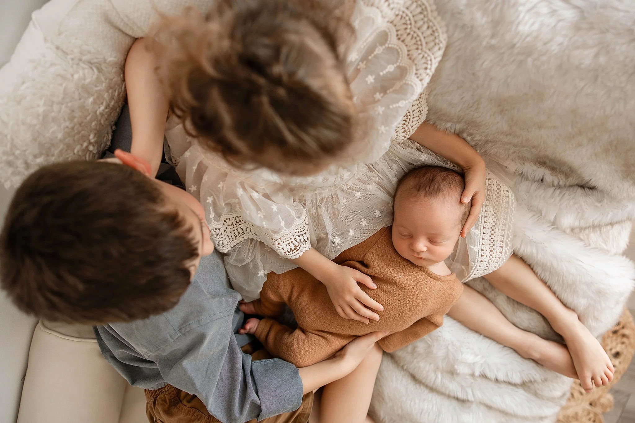 Metro Detroit newborn photographer capturing sibling connection