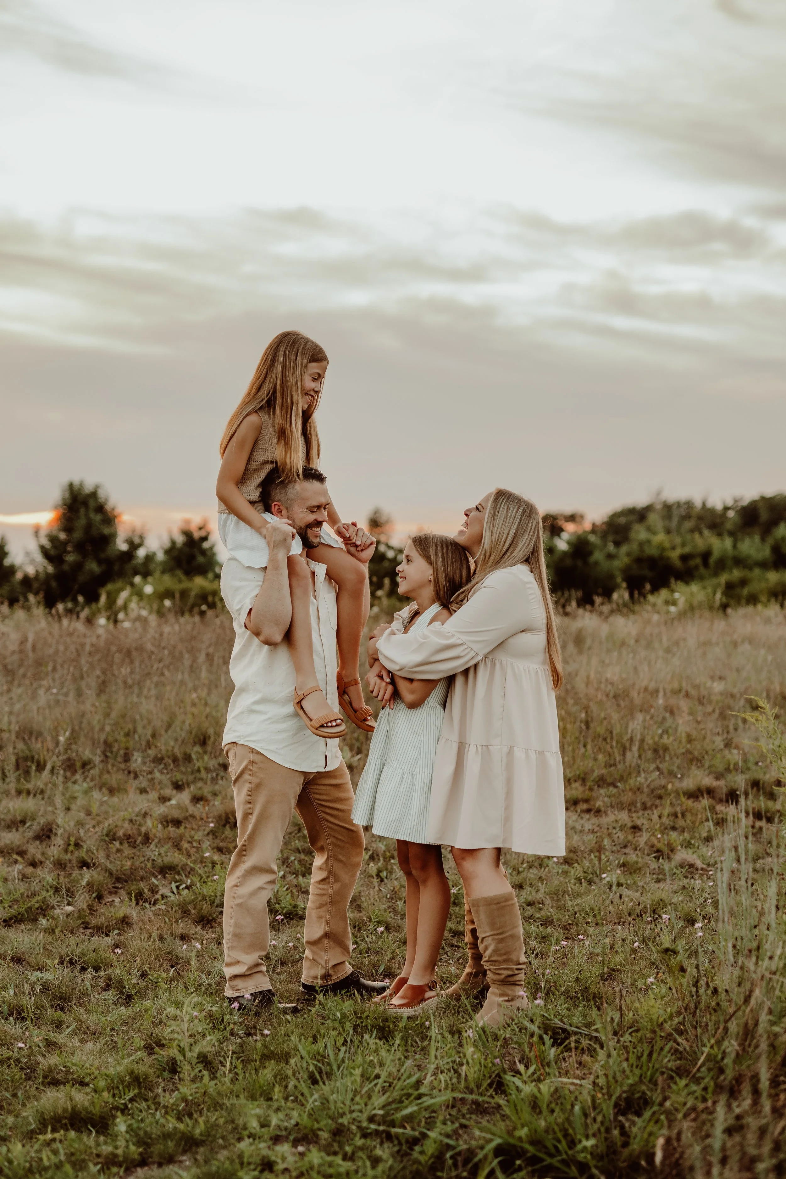 picture of detroit's best newborn photographer and her family
