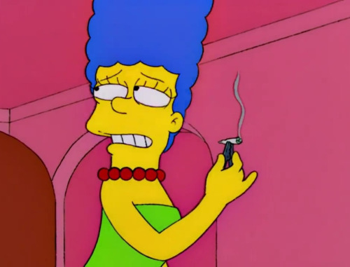Marge Simpson bogarts a joint.