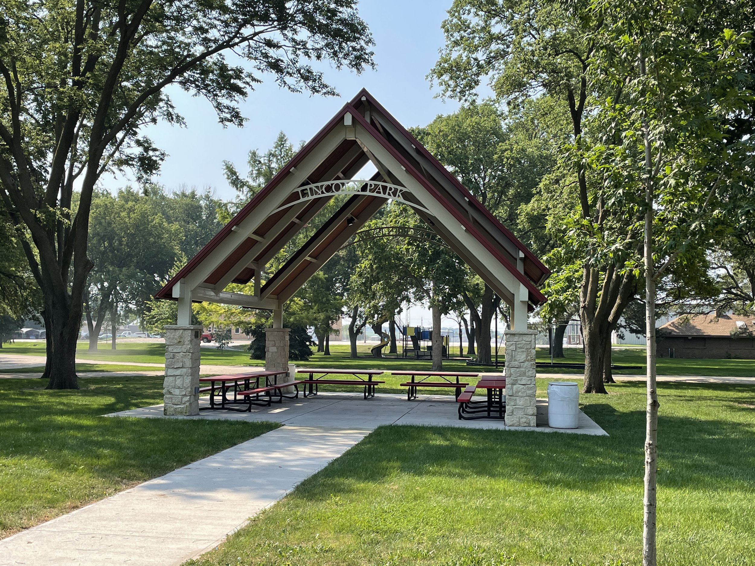   LINCOLN PARK PAVILION - The lighted shelter provides a shady spot for birthday parties, family reunions, picnics and a pleasant lunch break from work.  