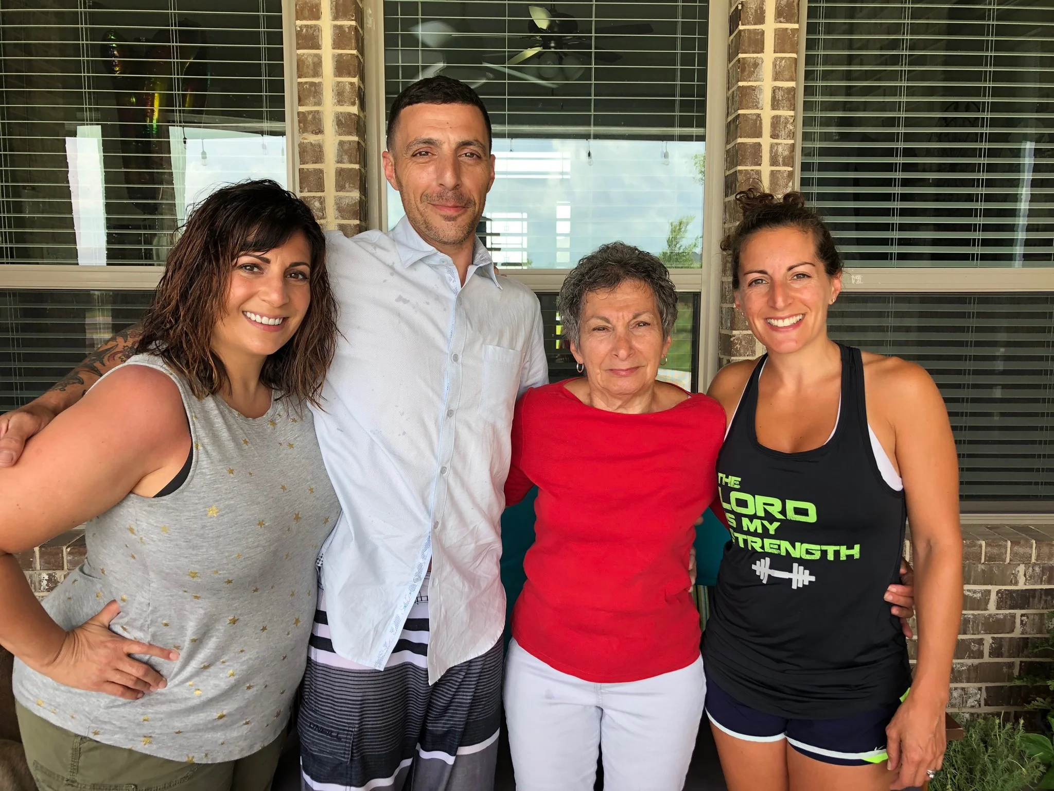 Jess with brother Artie, mom Eileen, and sister Rebecca.