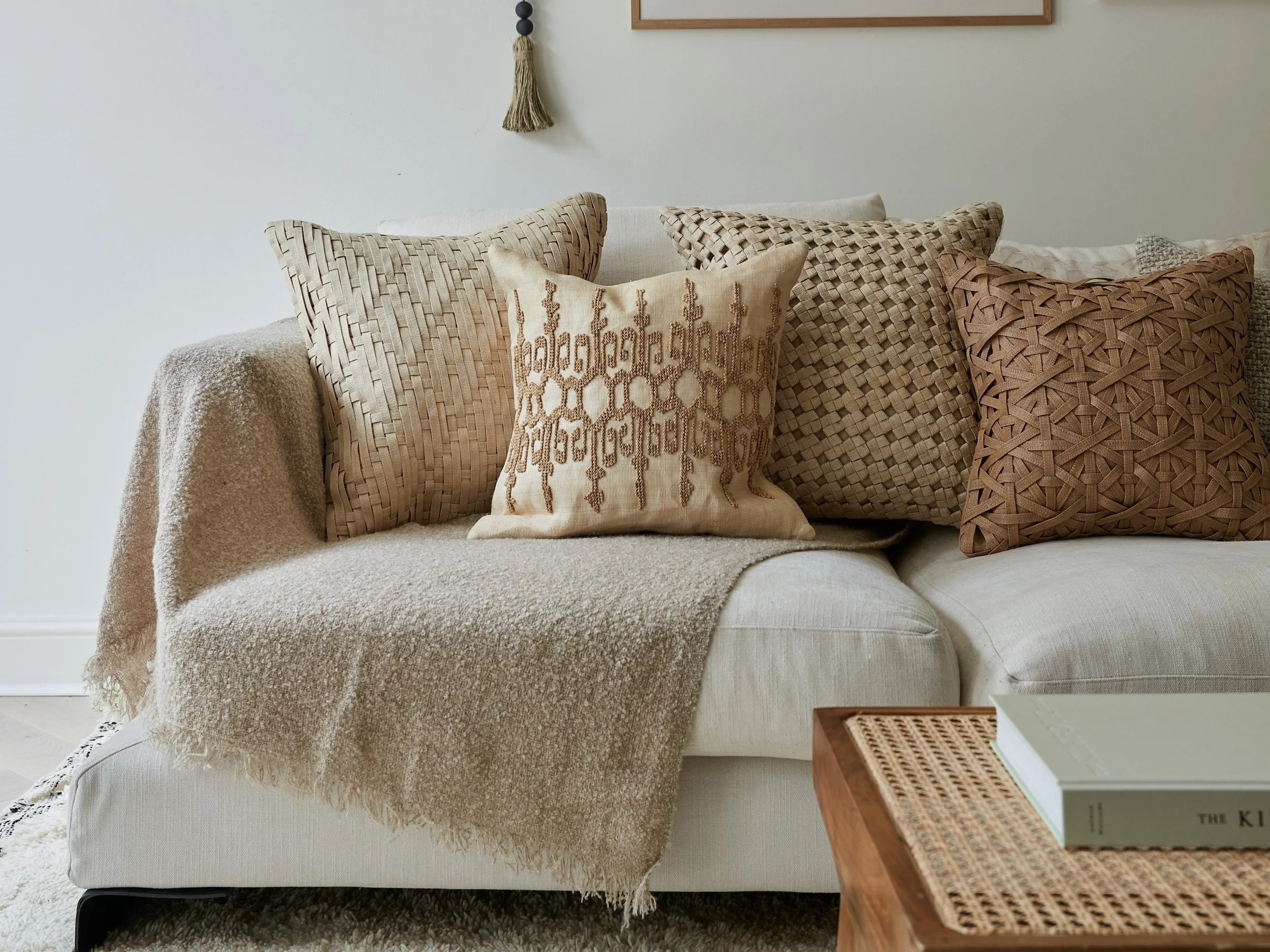 Contemporary living room styled with handcrafted décor, woven textures and natural materials.