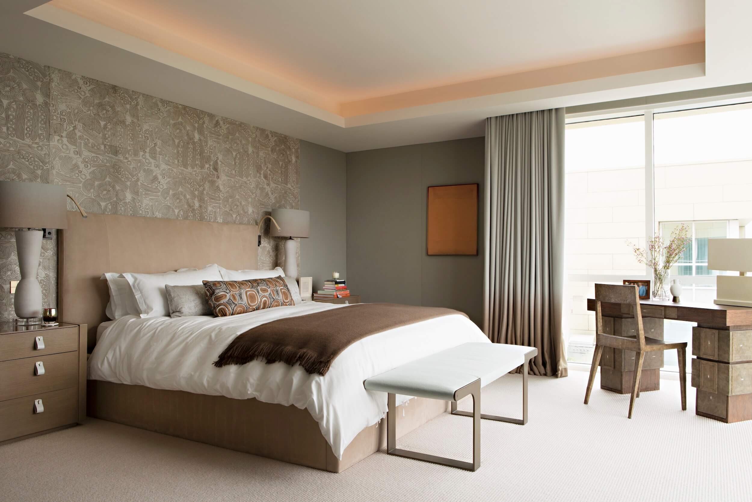 Master Bedroom with  Capricorn  ‘Jonathan’ hide upholstered walls, contemporary bedding and custom ombre drapery 