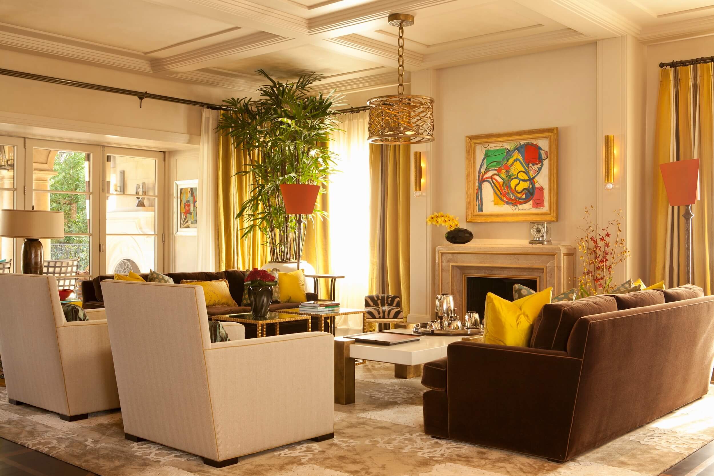 A Living Room with contemporary furnishing, tai Pin rug, Custom Drapery, and Herve van Der straiten pendant lamps