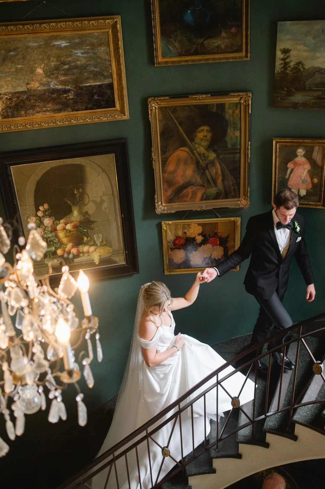 grand staircase at manor house wedding venue