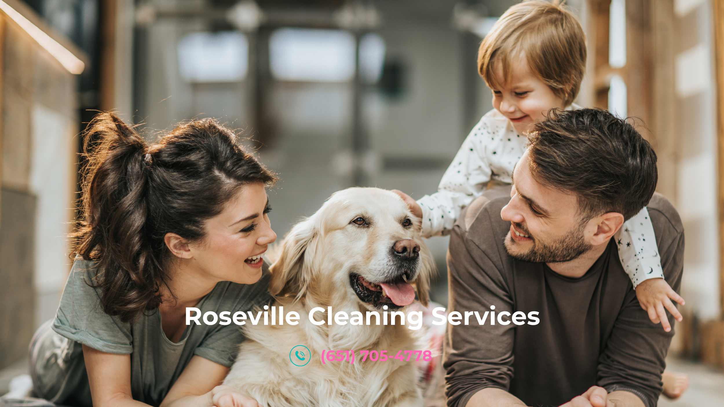 ="Happy family lying on the floor with their pet dog"