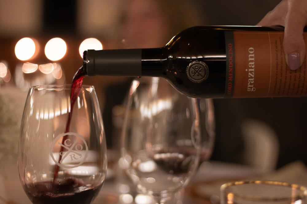 Grazino Coro being poured into wine glass