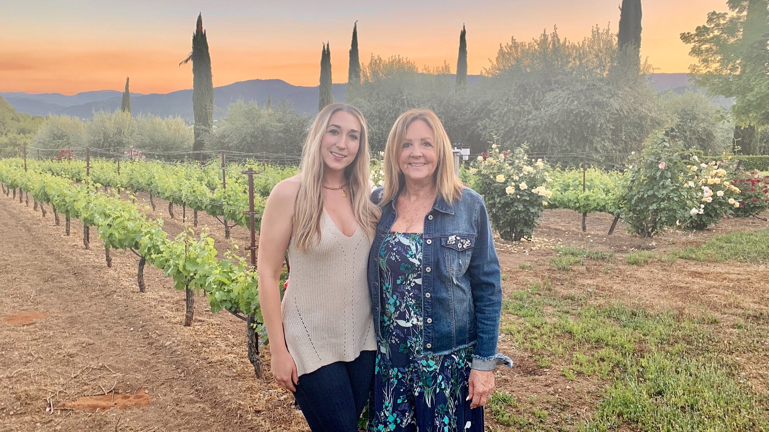 Alexandra and Trudi Graziano in front of vineyard