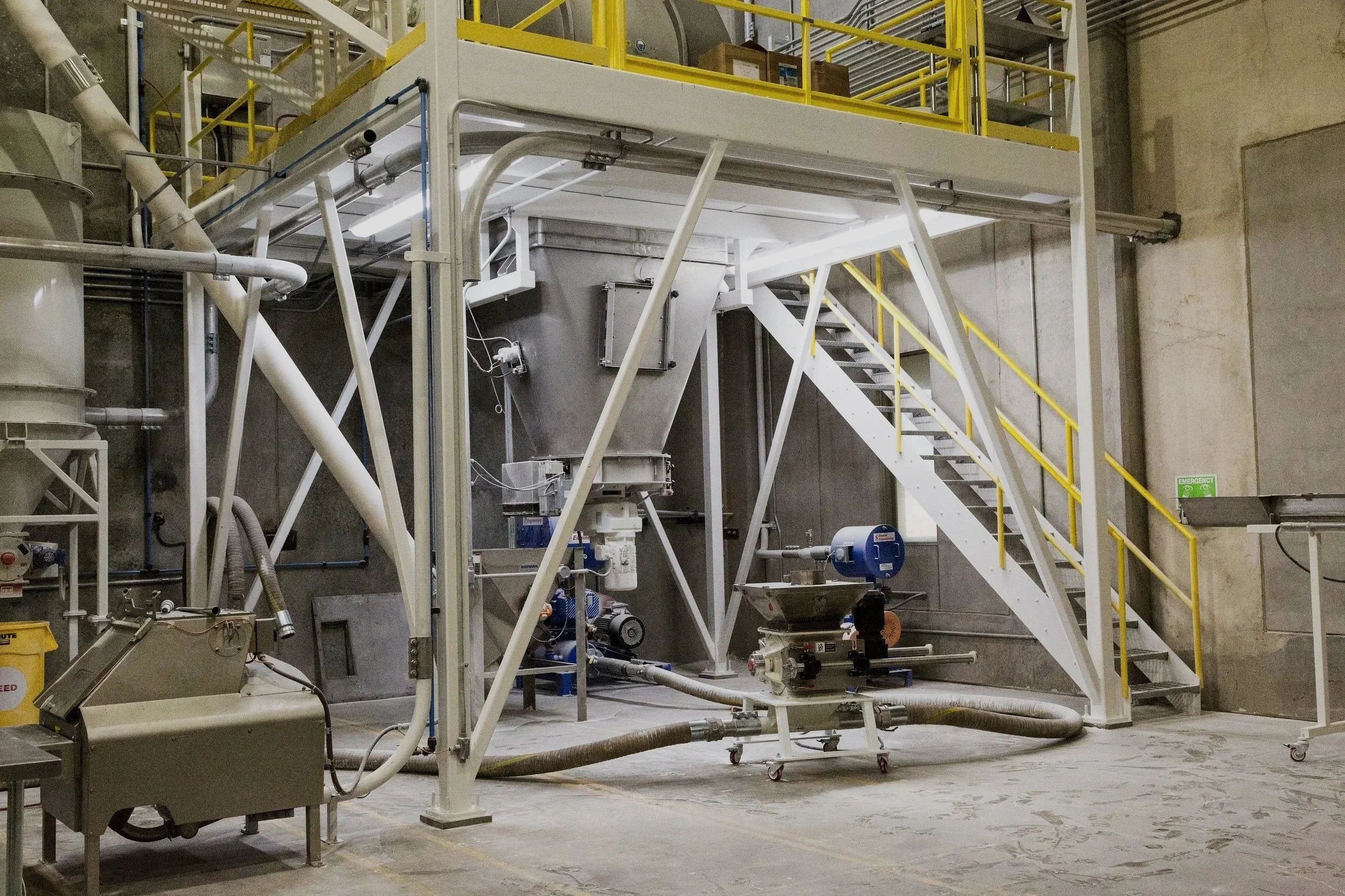 silver and yellow flour mill project, custom metal fabrication, JL Bryson Inc.