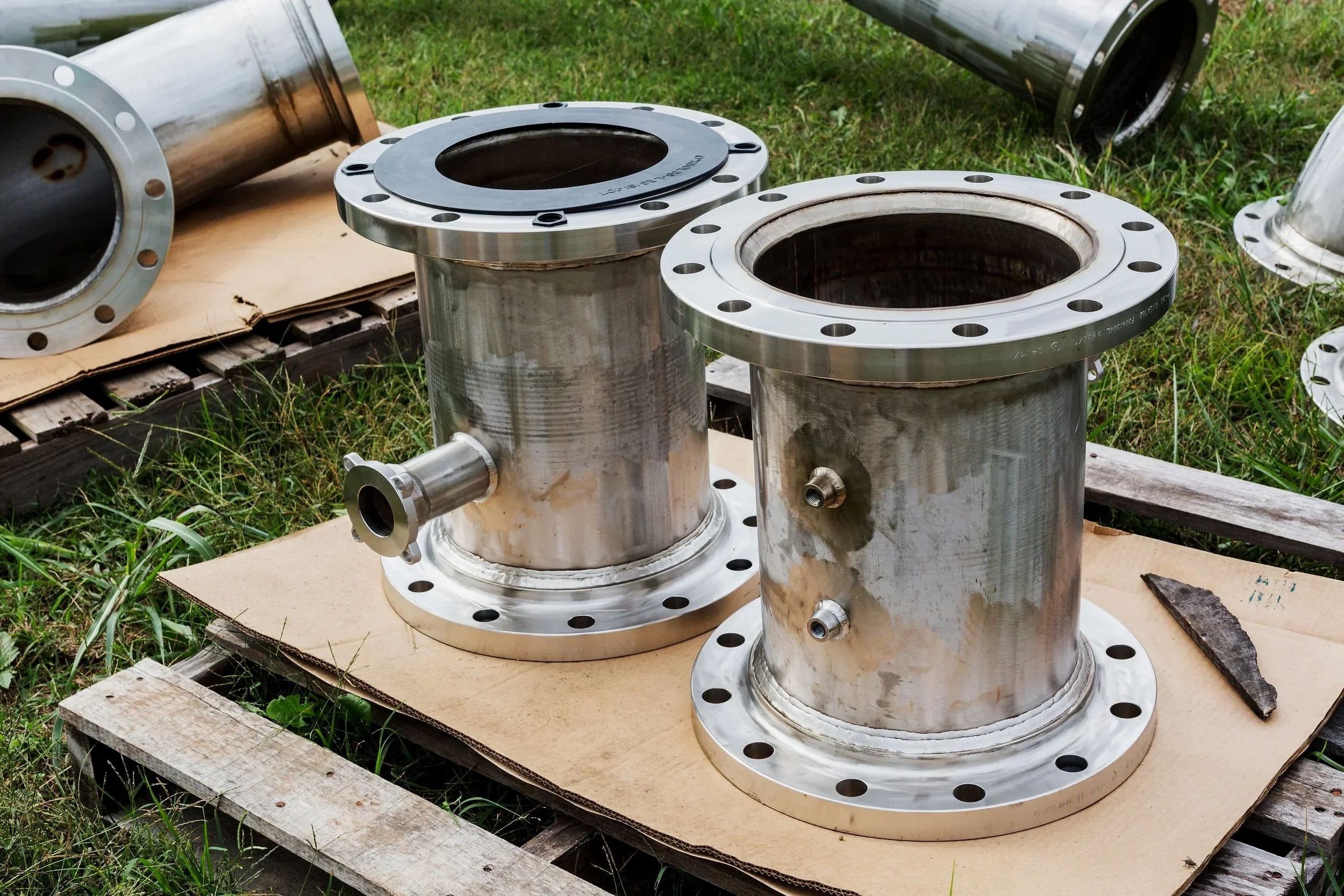 custom metal fabrication work, metal pieces sitting in grass, JL Bryson Inc.