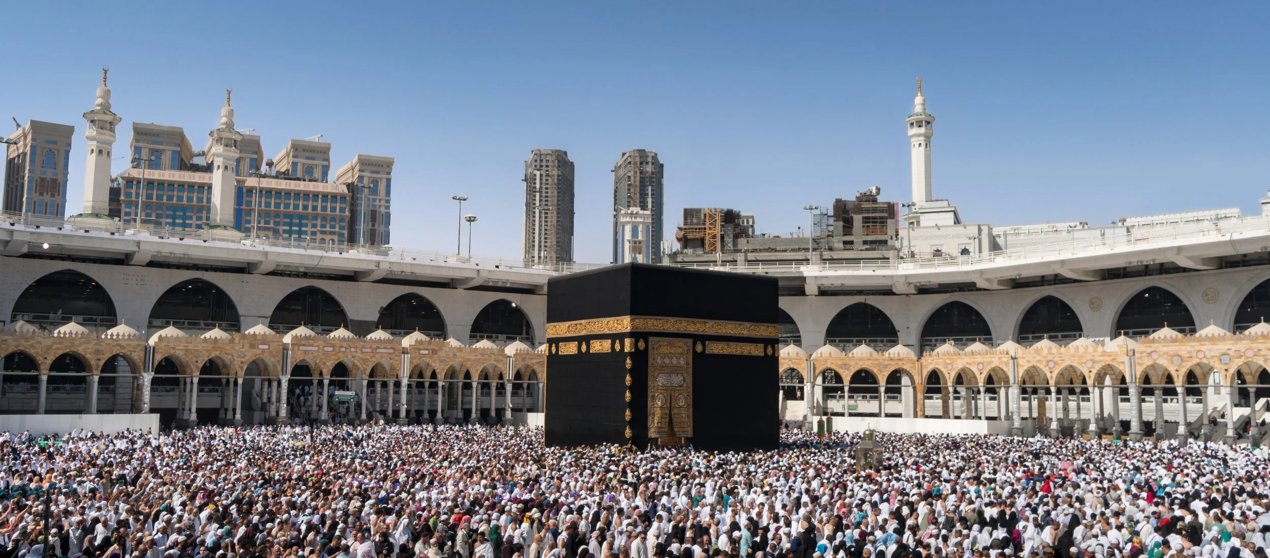 If Islam opposes idol worship, why do Muslims pray to a square structure?