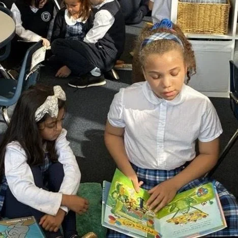 Reading Buddies pairs our Kindergarteners with 5th graders to read side by side. These sweet moments build friendships across grades, giving younger students role models and giving older students a chance to practice leadership and care. 📚❤️

#class