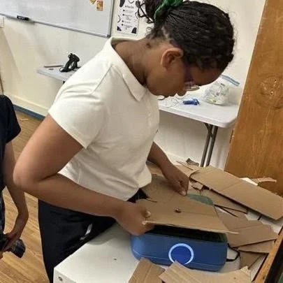 Our 5th graders are creating incredible cardboard self-portraits, studying facial proportions, and then carefully constructing their pieces with cardboard knives and a special cardboard power saw. They listened closely, worked patiently, and showed g