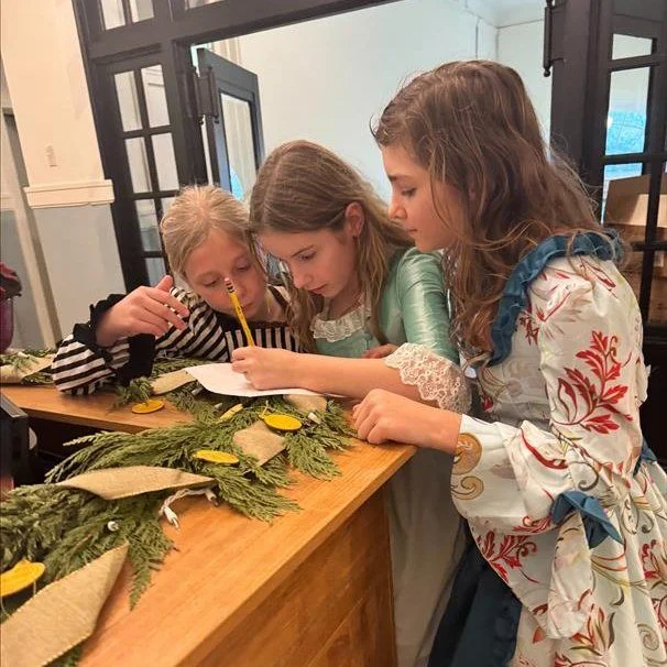 6th grade Christmas Party &mdash; Victorian era style.

Students enjoyed a white elephant gift exchange and treats, then were enlisted by Sherlock Holmes to solve the case of the Missing Victorian Box. The campus-wide scavenger hunt required students