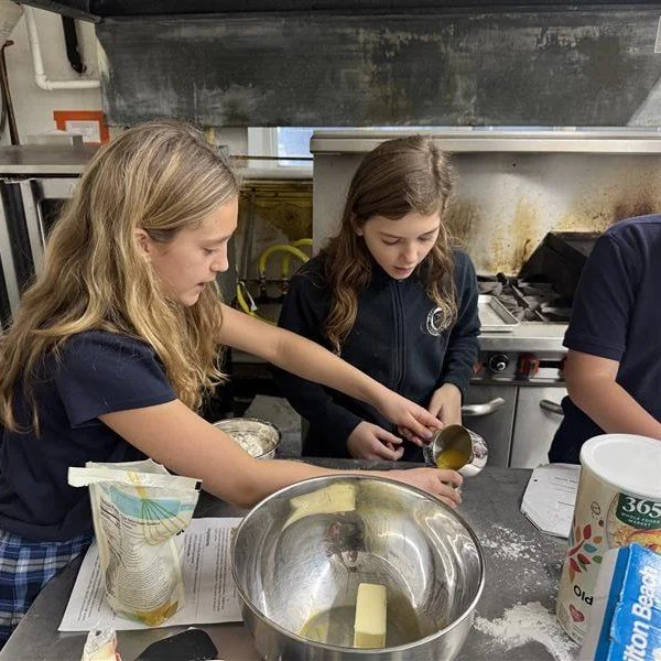 To wrap up their math unit on ratios, 6th grade students took a classic chocolate chip cookie recipe and halved or quartered it using ratios. Along the way, they added their own creative twists, budgeted for ingredients, shopped at Trader Joe&rsquo;s