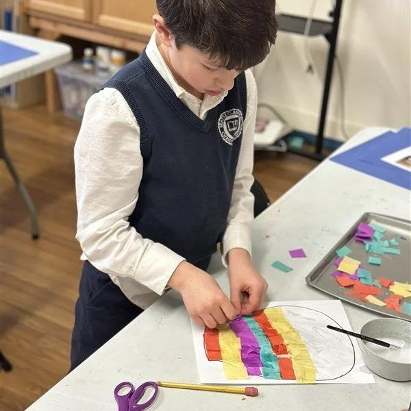 In art, 2nd grade students learned about the first successful hot air balloon launch and then created their own balloons using tissue paper decoupage and woven paper baskets.

History, art, and imagination came together as students learned how human 