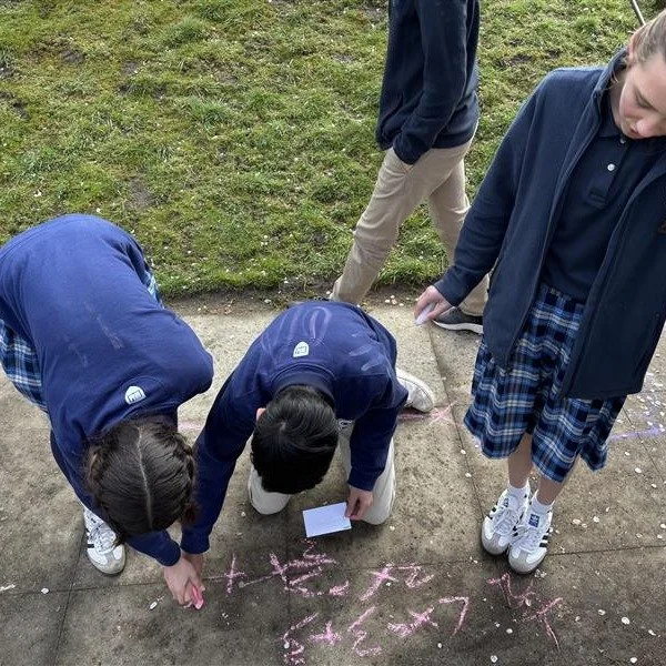 Our Algebra 1 students took learning outside with a math game called Sidewalk Inequality Showdown! Working in teams, students solved multi-step inequalities and graphed their solutions using chalk along the sidewalk.

#goodnesstruthbeauty #classicalc