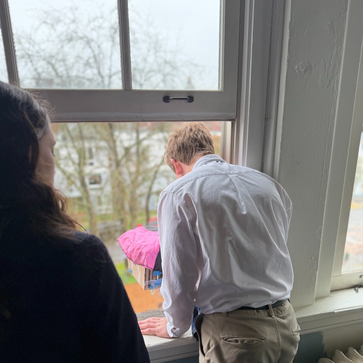 8th Grade put their physics skills to the test in an egg drop competition, designing creative solutions, from parachutes made of trash bags to bubble wrap and rubber band suspension systems, to safely carry their eggs through a two-story drop, cheere