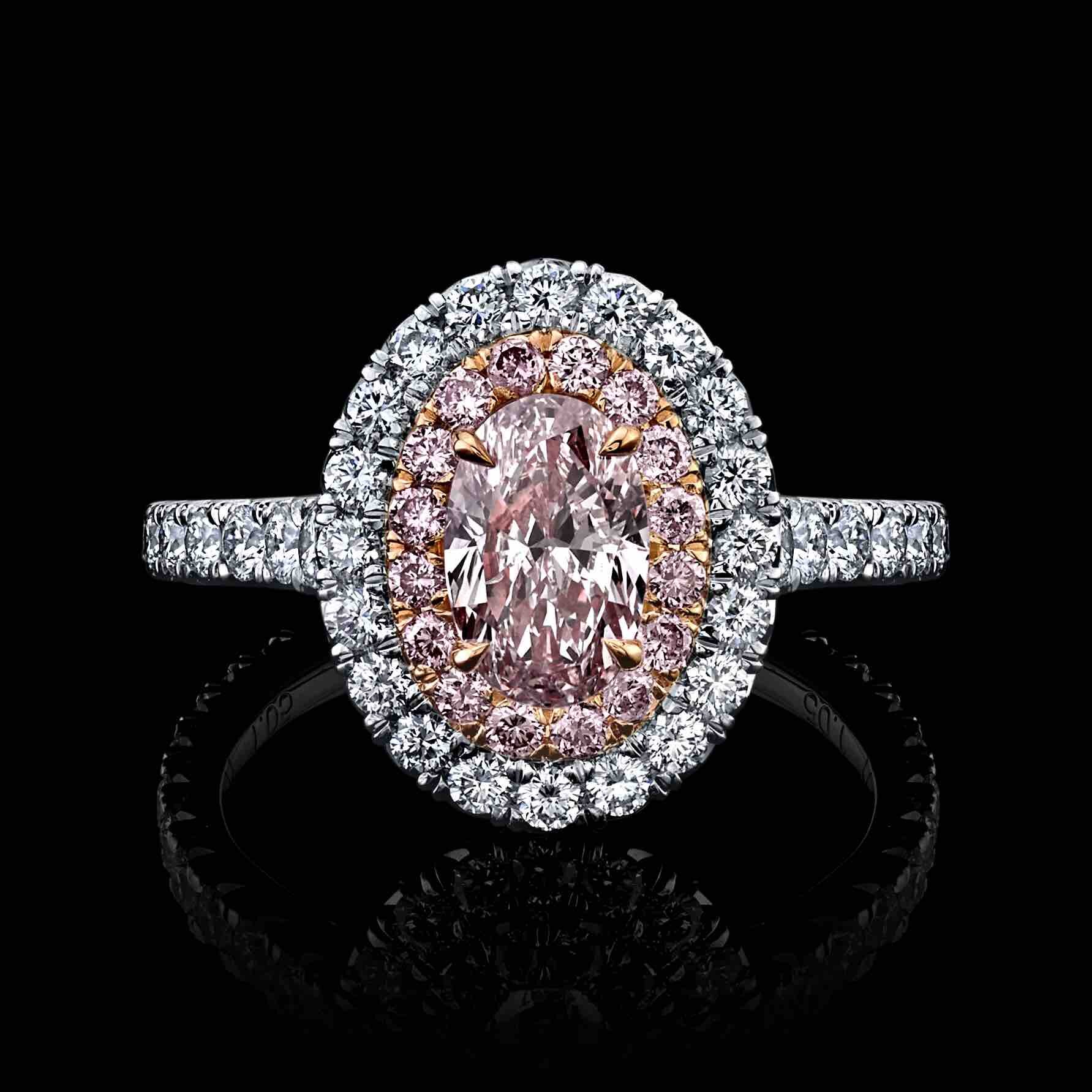 A sweet Oval Cut 1.05ct Light Pink Diamond set in a platinum double halo ring 