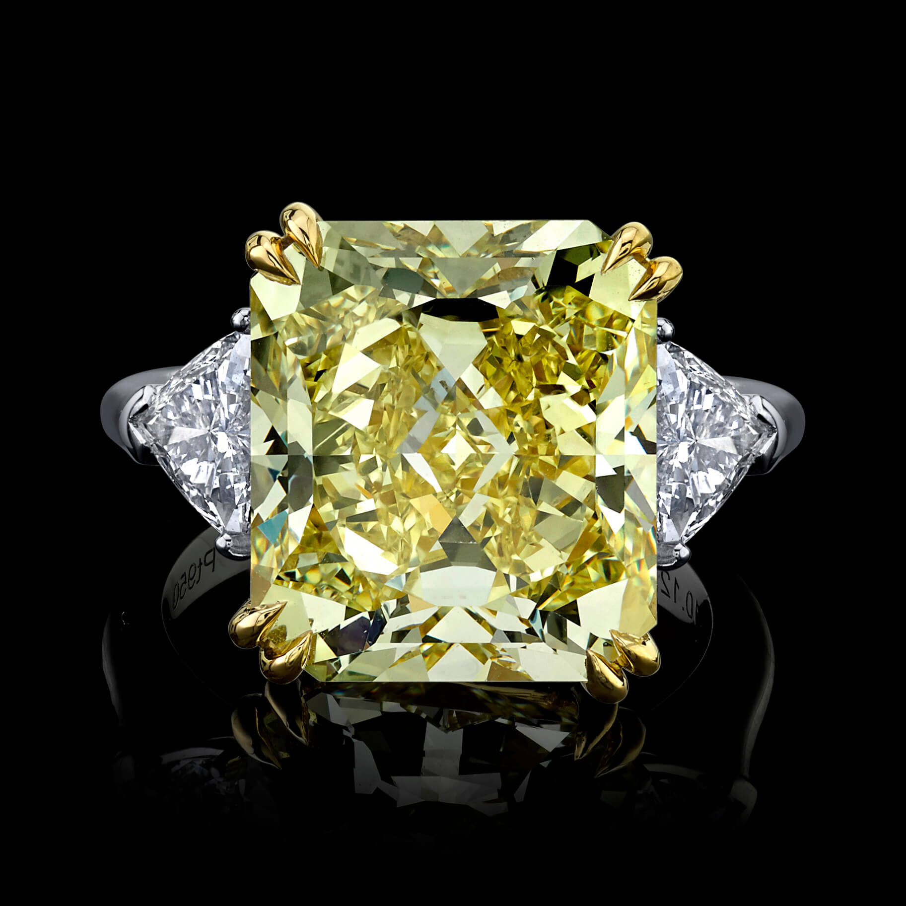 An impressive and important 10.12ct Fancy Intense Yellow diamond ring 
