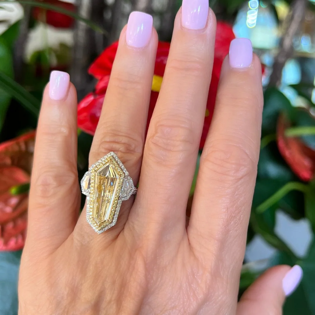 5.03ct Kite yellow diamond hand.PNG